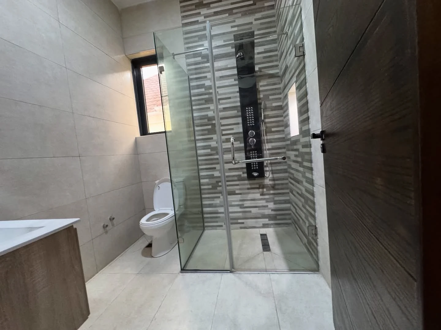 Glass shower enclosure installation
