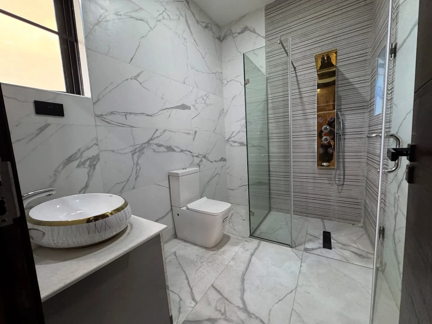 Wall-hung toilet and basin installation